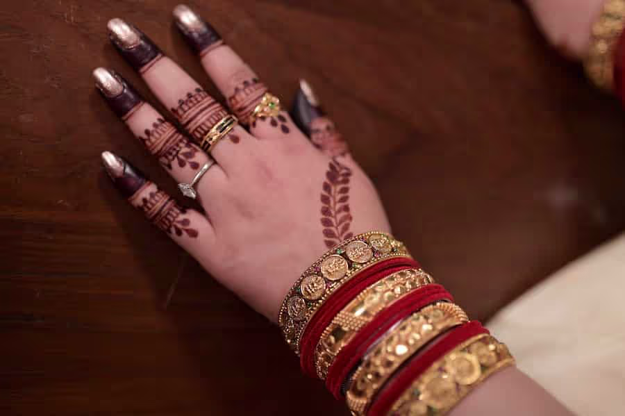 Gold jewellery and silver bullion displayed in a showroom as investors track precious metal prices across India.